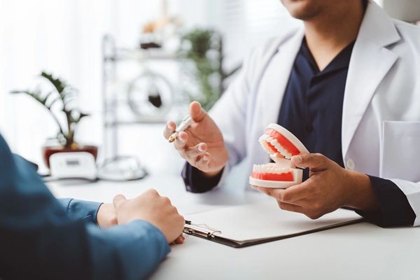 Ways You Can Keep Your Implant Supported Dentures Clean And Functional